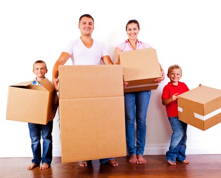 Careful packing of office equipment and files for an Enfield move