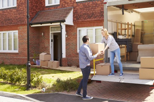 House removalists loading furniture for an Enfield home move