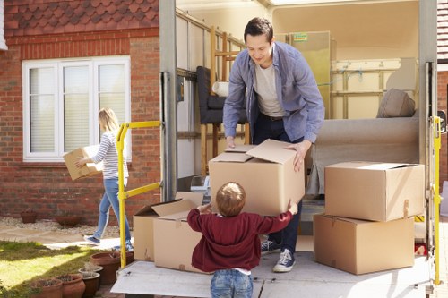 Professional home moving service in Enfield with boxes and furniture transport