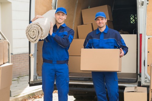 Professional removals team helping with a home move in Enfield