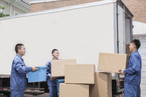 Commercial moving vehicle supporting an Enfield business relocation