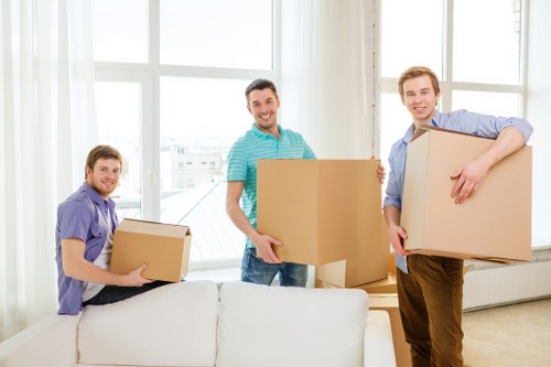 Careful packing and handling of furniture and boxes during an Enfield move