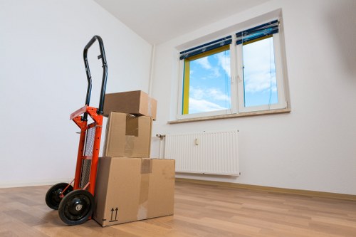 Bulky furniture loading during a pickup service in the Enfield area