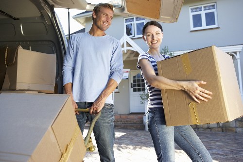 Loading furniture into a removals van in Enfield